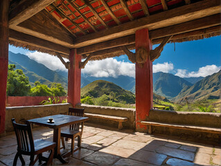 A lonely table and a cup of coffee in a high altitude restaurant up in the andes mountains with breathtaking view.