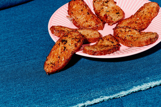 slices of fried seitan in a plate