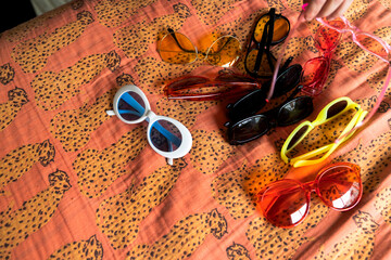 Pile of stylish sunglasses