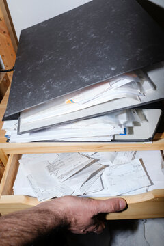 Man organizing receipts for his business accountability