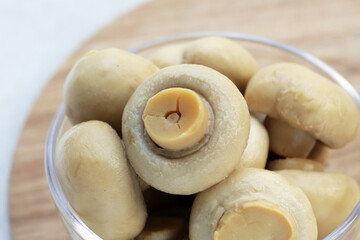 Champignon mushrooms in brine. Canned champignon mushrooms whole
