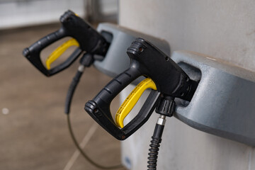 Pressure guns at a car wash