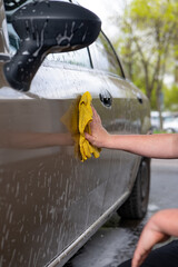 Cleaning a car with microfiber