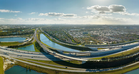 View from above of USA transportation infrastructure. Aerial view of american freeway intersection...