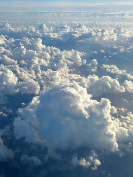 Above the white clouds and blue sky