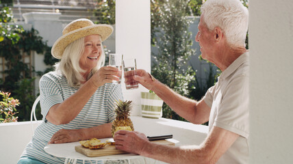 Senior, couple or drink in garden with toast for retirement, planning vacation for anniversary....