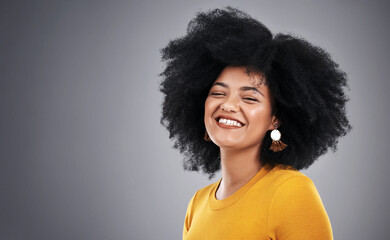 African, beauty and woman with natural hair care in studio, background and mock up with happiness....