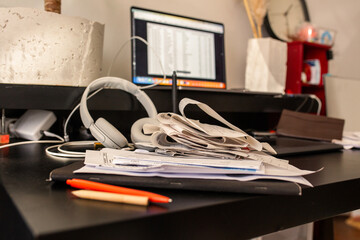 Messy workplace with receipts