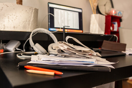 Messy workplace with receipts