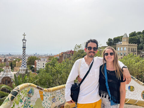 A couple portrait posing for the camera in the Park G&uuml;ell  in Spain