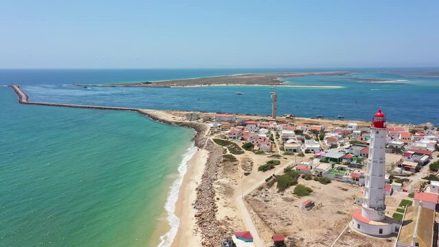 Aerial view of the Ilha do Farol lighthouse island located in the Algarve tourist region on Portugal's southern coast. View of the Ria Formosa.