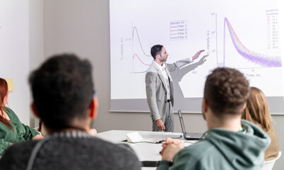 Speaker Performing Presentation To Audience