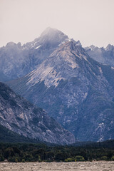 top of Cerro Lopez, rocky mountain in southern Argentina, Bariloche and San Martin de los Andes, Patagonia Route 40. Poplar trees in autumn changing color to yellow-green