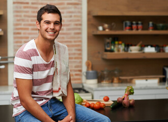 Cooking, smile and portrait of man in kitchen for food, wellness and nutrition with confidence....