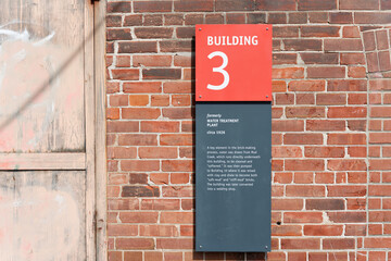 Obraz premium exterior wall and sign outside Building 3 (Water Treatment) located at Evergreen Brick Works in Toronto, Canada