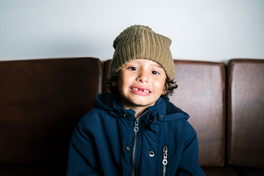 Portrait of a small child without two front teeth
