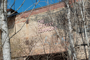 Fototapeta premium view of exterior wall and sign of Tiffany Commons located at Evergreen Brick Works (550 Bayview Avenue) in Toronto, Canada