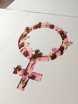 Paper cut female symbol in the making