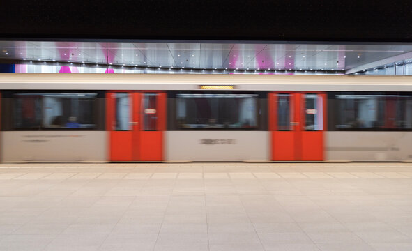 metro departing from platform