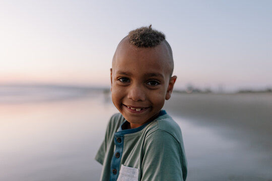 Portrait of young boy at the beach