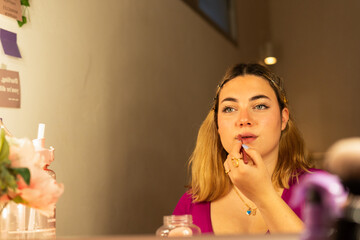 Makeup Mastery: Teen Applying Lipstick 