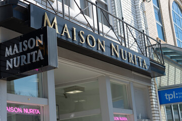 Fototapeta premium exterior building and sign of Maison Nurita, a furniture store, located at 609 Mount Pleasant Road in Toronto, Canada