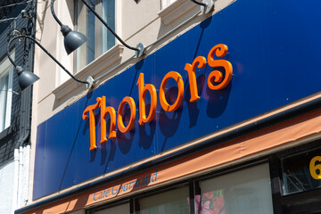 Fototapeta premium exterior sign of Thobors Bakery, a pastry shop, located at 627 Mount Pleasant Road in Toronto, Canada