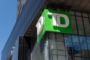 Fototapeta premium upward look at TD Canada Trust Branch and ATM sign located here at 2263 Yonge Street (corner of Eglinton Avenue West) in Toronto, Canada