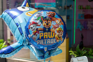 Fototapeta premium mylar balloons with popular characters outside a shop in Toronto, Canada