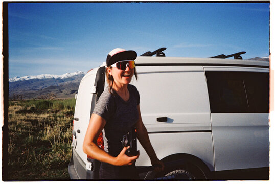 Film Photo: Happy woman by her camper van
