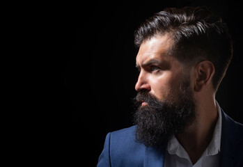 Male face profile with beard and mustache. Shampoo and conditioner for a clean and soft beard. Man...