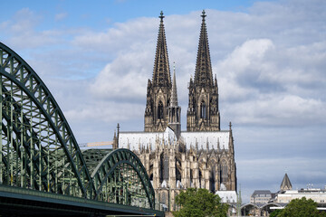 view of the east side of cologne cathedral from the hohenzollern bridge to the crossing tower and...