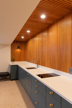 Vertical Wood Paneling in Modern Home  Kitchen recessed lighting 