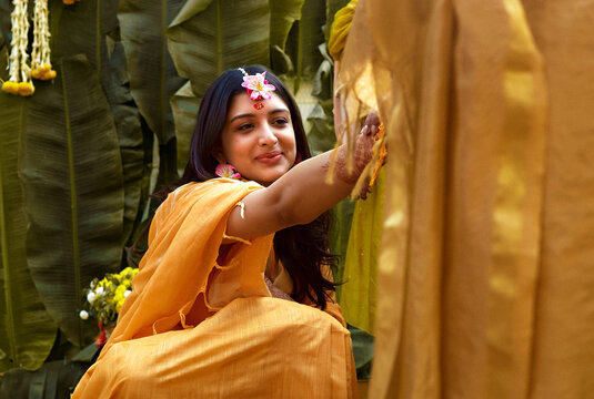 Portrait of an Indian bride during the traditional Haldi wedding