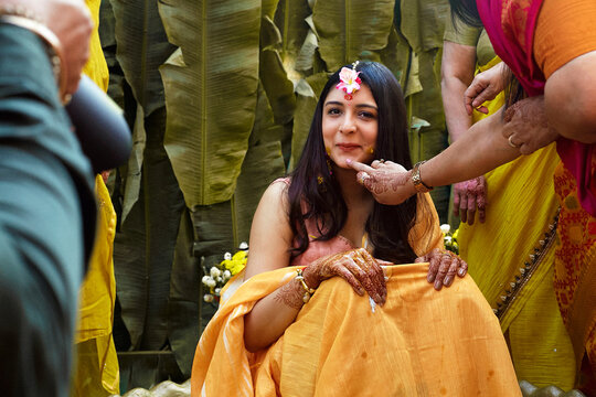 Portrait of an Indian bride during the traditional Haldi wedding