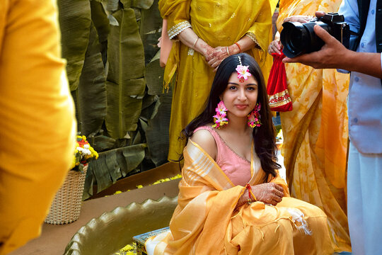 Portrait of an Indian bride during the traditional Haldi wedding