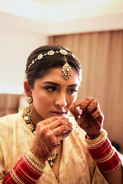 Portrait of an Indian bride getting ready for her wedding  ceremony
