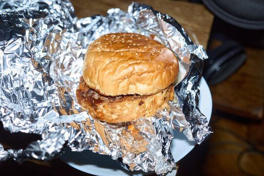 Tasty burger in a foil