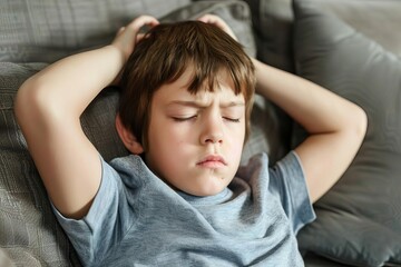 sad autistic boy covering ears stressed kid overwhelmed by sensory input - obrazy, fototapety, plakaty