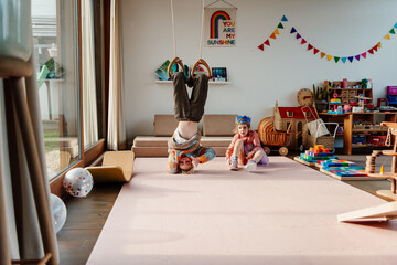 Two kids in their playroom