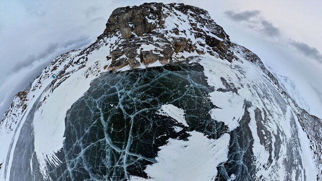 Arctic Polar Circle tiny planet - scientific formula engraved in ice