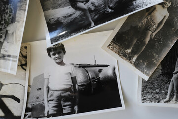 a collage of old photos from the boy's childhood