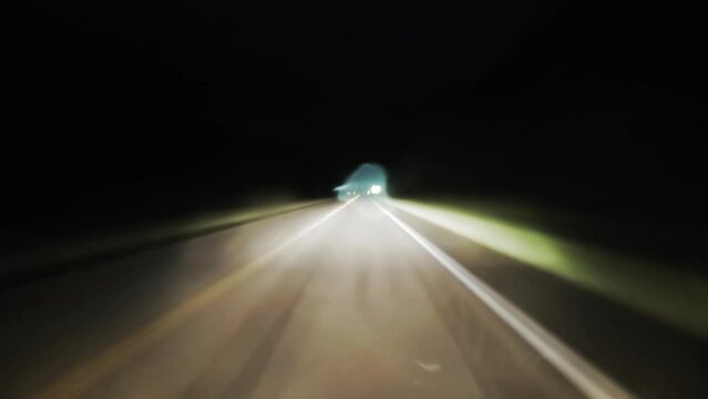 Point Of View Time Lapse Shot Of Illuminated Cars Moving On Road Against Clear Sky At Night - Jefferson County, Texas