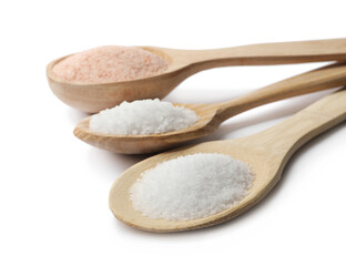 Different types of natural salt in wooden spoons isolated on white