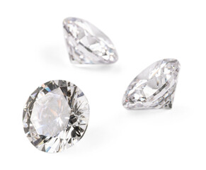 Three beautiful shiny diamonds isolated on white