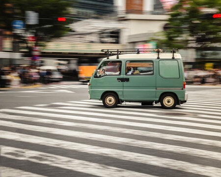 Small, Green Van on Shibuya Crossing