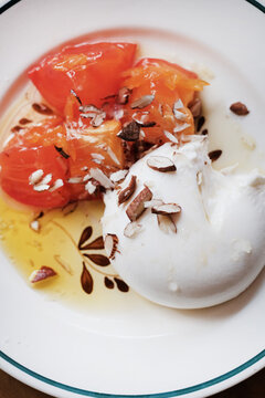 Burrata dish on a plate, close-up