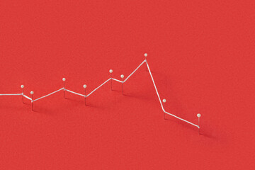 White string connecting straight pins on red paper background