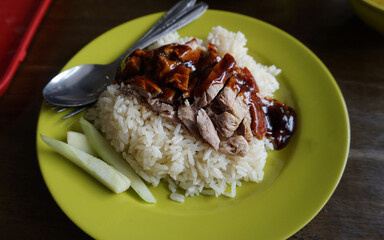 chicken rice or rice steamed with chicken soup - Asian food style