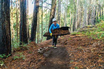 Woman volunteering in the forest 